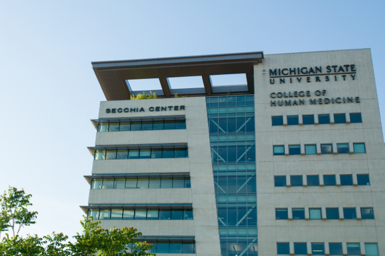 The Secchia Center, taken from street level looking up at the building.